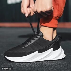 a pair of round toe black sneakers, has lace up detail;cushioned footbed; texture
