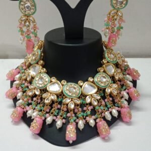 Traditional Kundan Necklace Set with Pearls and Green Bead Detailing